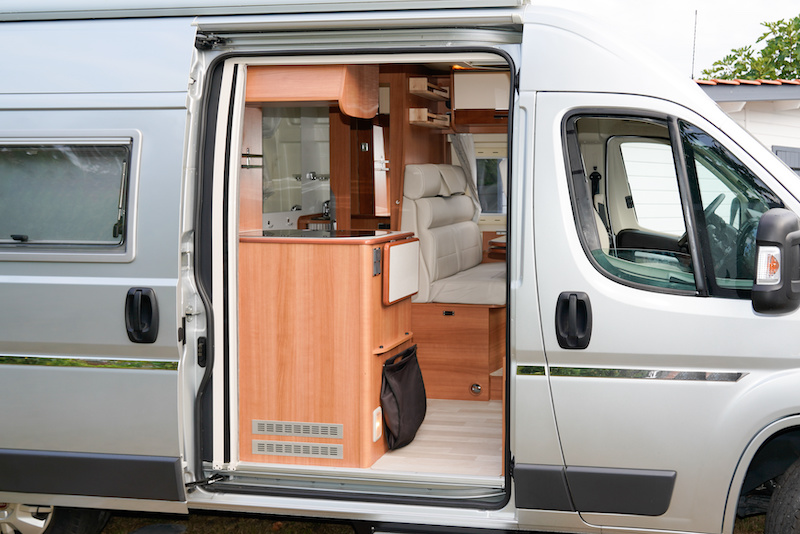 Vacation travel in RV trip in motorhome with modern van